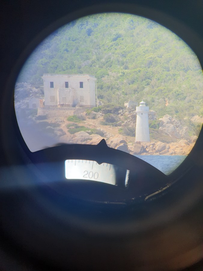 Lighthouse through binoculars